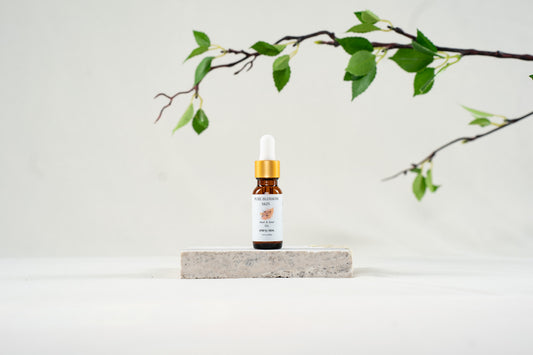 1/2oz amber glass bottle with gold trim dropper top of Heal & Seal OIL | Pure Blossom Skin